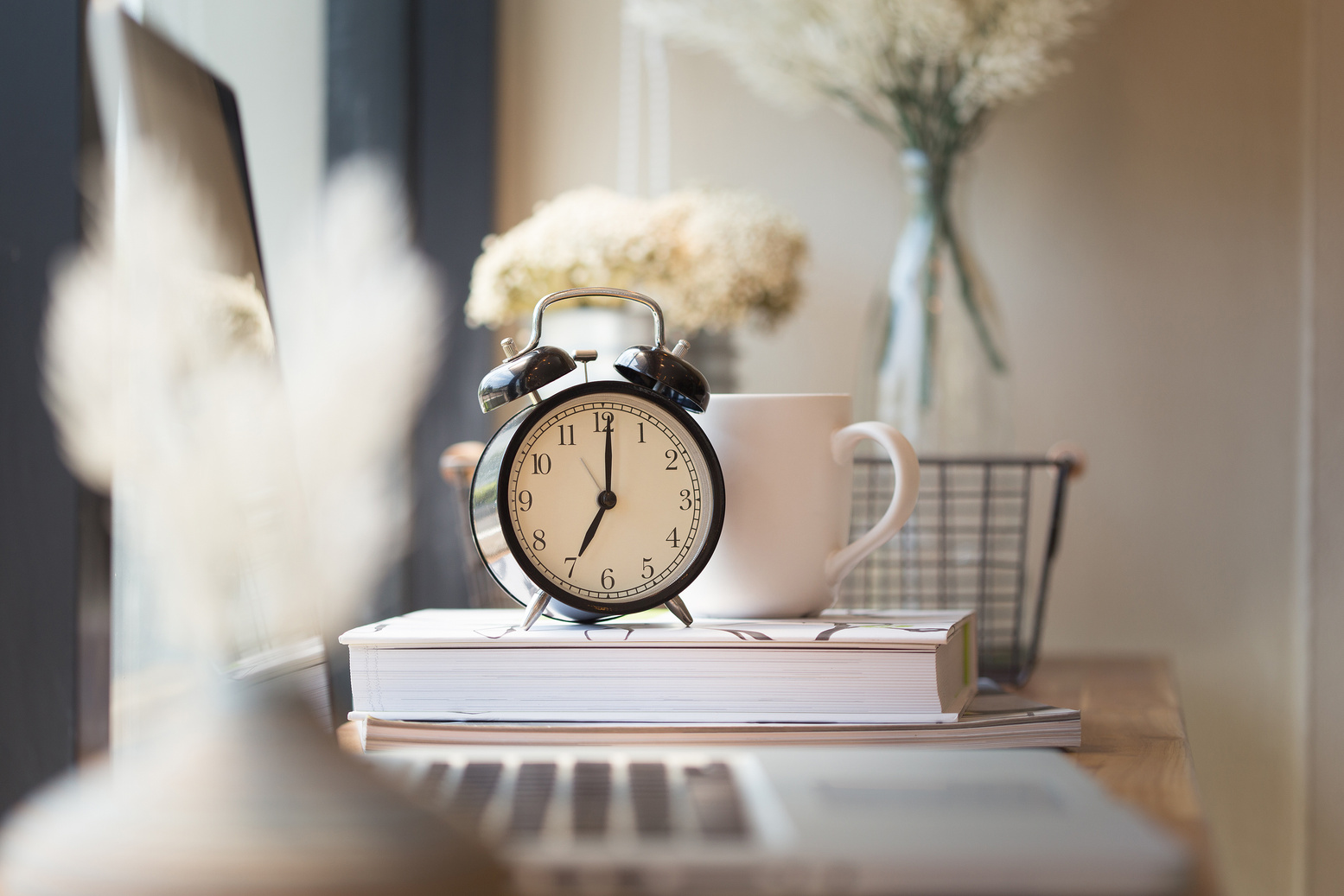 photo of clock on office desk.