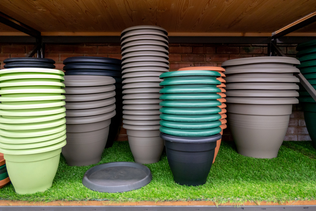 Variety of plastic flower pots and garden planters